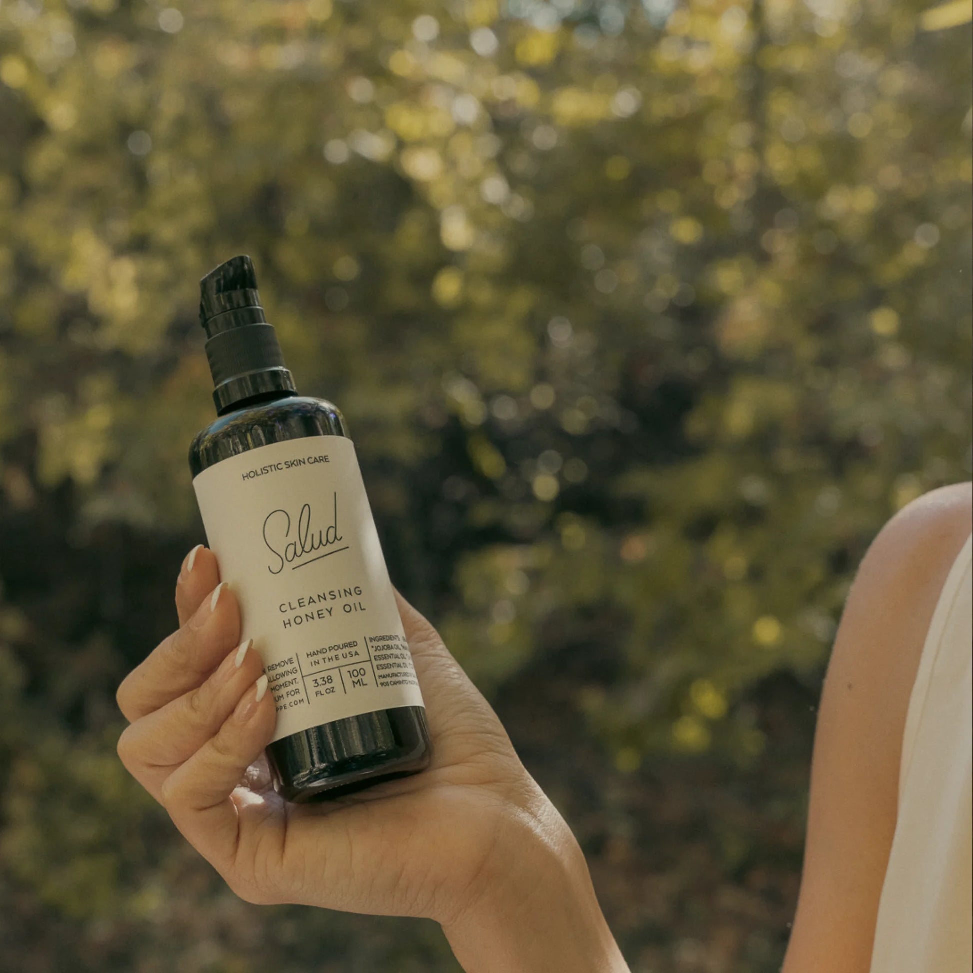 Cleansing Honey Oil bottle with natural ingredients for clarifying skin